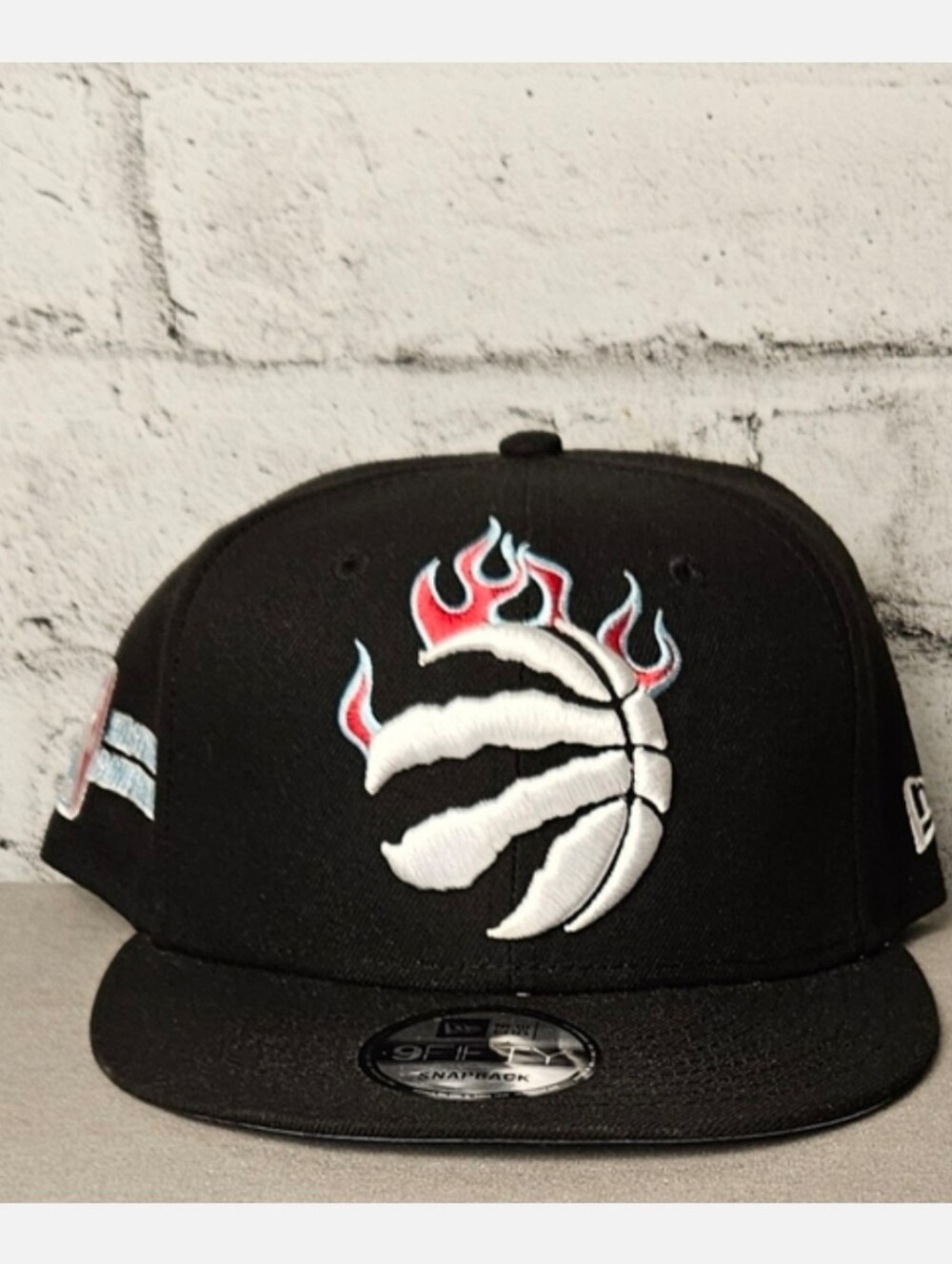 New Era Toronto Raptors Flaming Claw 9FIFTY Snapback Hat NBA